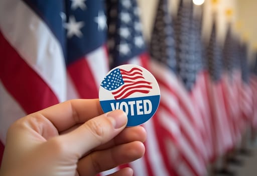 Close-up of an "I Voted" sticker on a hand, with American flags in the background, capturing pride in participating in democracy. High quality photo