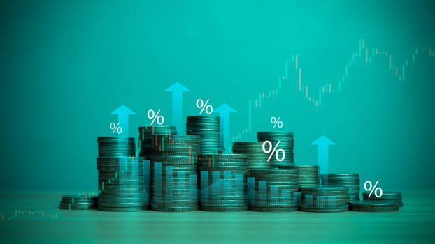 Coins are lined up on a wooden floor along with index charts, arrows and candlesticks. Represents financial, economic, business growth concepts. Financial success concept. Abstract finance background.