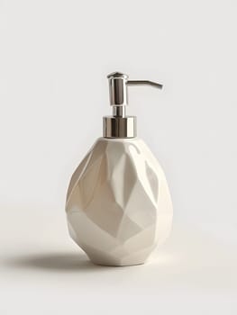 A white glass bottle liquid soap dispenser is displayed on a white drinkware surface, adding a touch of elegance to any bathroom or kitchen decor