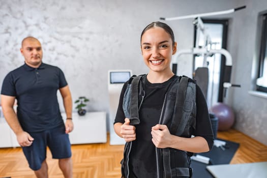 A woman is preparing for an energizing workout with personalized guidance.