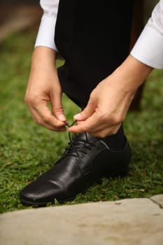 Professional man, fine gentleman, business executive fitting to their suit and preparing for daily office job, dressing to gentleman suit good for executive magazine or multimedia content creation
