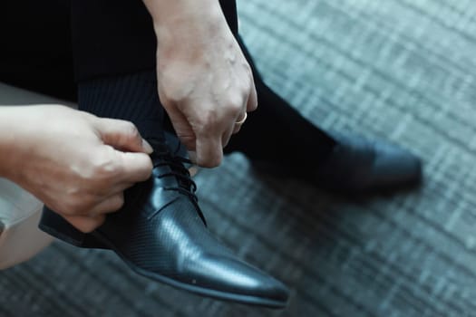 Professional man, fine gentleman, business executive fitting to their suit and preparing for daily office job, dressing to gentleman suit good for executive magazine or multimedia content creation