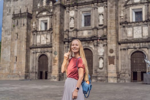 Female tourist in front of Catedral de Puebla, Mexico. Travel, cultural heritage, and historic architecture exploration concept.