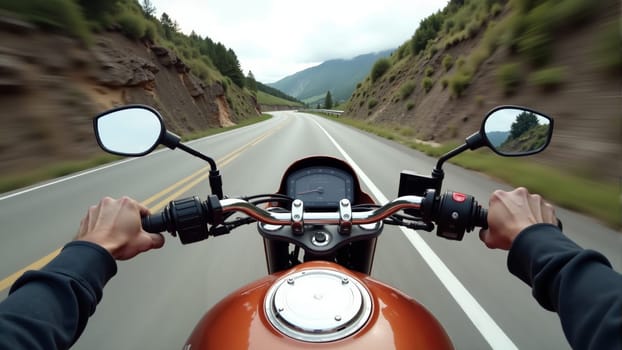 Feeling the rush of the wind while cruising on an orange motorcycle, surrounded by majestic mountains and vibrant greenery, the open road beckons adventure under a cloudy sky.