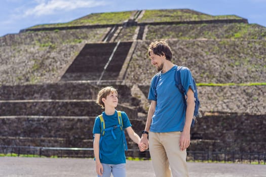 Father and son tourists exploring Teotihuacan, Mexico. Cultural heritage, ancient ruins, and archaeological adventure concept.