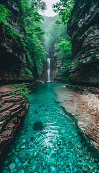 A stunning waterfall cascades down in the middle of a lush canyon, surrounded by green terrestrial plants and grass in the riparian zone of the flowing river