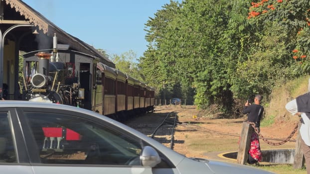The iconic Maria Fumaca steam train at Tiradentes station, a historic and vibrant scene, ready for departure as tourists capture photos on June 14, 2024.