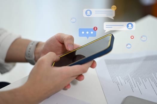 Close up of woman checking social media notifications on smartphone.