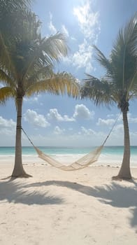 A tranquil hammock strung between two palm trees on a sunny beach day, perfect for relaxation.