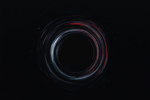 Abstract circular light trails in dark space.