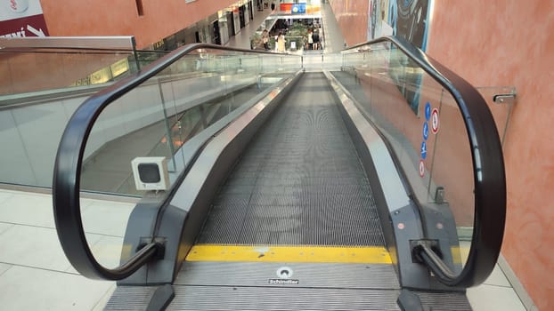 October 22 2024 Hradec Kralove, Czech Republic Europe, Kralov region, Kralovehradecky kraj, shopping mall, escalator, commercial building. High quality photo