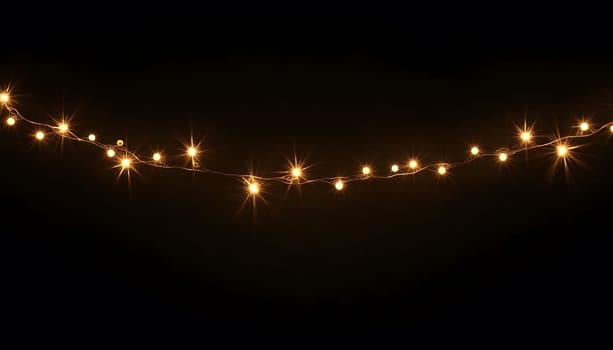 A set of twinkling fairy lights, isolated on a dark background to emphasize their glow and festive spirit. Perfect for adding a warm holiday ambiance