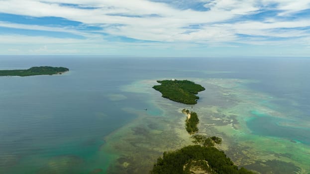 Aerial view of tropical landscape with islands and blue sea. Ocean and blue sky. Negros, Philippines