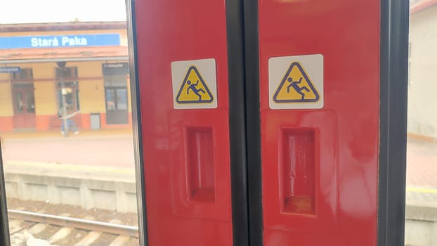 October 21 2024 Stara Paka, Czech Republic, street, railway station, building, transport, movement, sign. High quality photo