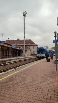 October 21 2024 Stara Paka, Czech Republic, street railway station, building, transport, movement, sign. High quality photo