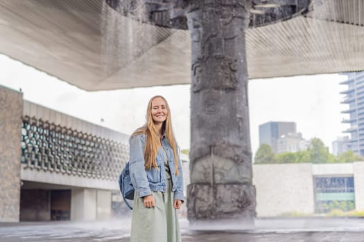 Female tourist exploring the National Museum of Anthropology in Mexico City. Cultural heritage and historical exploration concept.