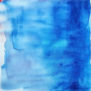A vibrant watercolor piece showcases various shades of blue blending gently together, creating a soothing background that highlights artistic expression.