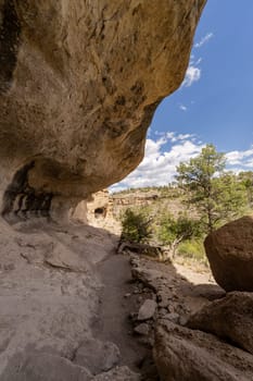 For thousands of years, people used the caves above Cliff Dweller Creek as shelter. In the late 1200s, people of the agricultural Mogollon, Southern Ancestral Pueblo, culture made it a home.