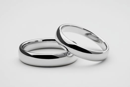 Two elegant gold wedding rings symbolizing love, commitment, and unity Perfect for marriage related themes, engagements, and romantic celebrations.