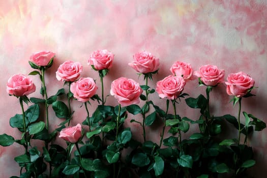 pink roses and rosebuds arranged on a soft pink background with space for text. Flat lay design of pink floral arrangement for a romantic setting..