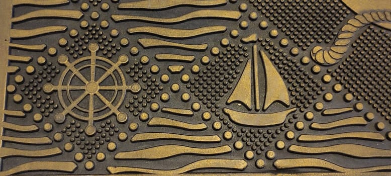 yellow brown floor rug with nautical marine theme, anchor ships, shells, home objects, background interior design materials .High quality photo