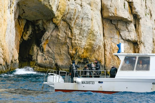 Marseille, France, June 09, 202, Scuba divers on boat school. High quality photo