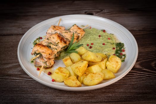Barbecued salmon skewer with potatoes and broccoli Puree, High quality photo
