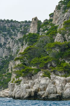 Marseille, France - June 9, 2024 : Calanque of En-Vau on the Coast of Provence, Calanques National Park seen from an excursion boat cruising, High quality 4k footage
