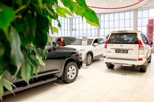 Kazan, Russia - November 25, 2022: Cars in showroom of dealership Toyota in Kazan in Russia