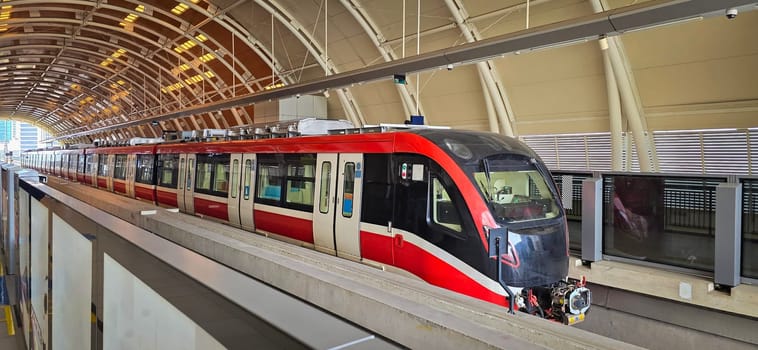 Light Rail Transit or LRT or rail transport system in Indonesia, modern metro train stationed at an urban platform, showcasing efficient public transport and contemporary infrastructure