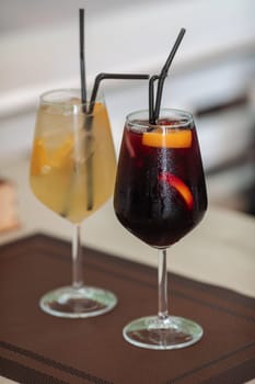 A glass of fresh delicious sangria on the table in the restaurant.