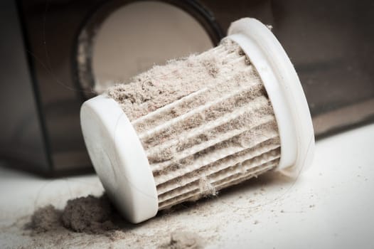 closeup common household dust on HEPA (High efficiency particulate air) filter from the vacuum cleaner.