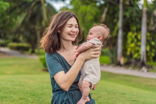 A happy 40-year-old mother cradles her newborn in a sun-drenched park. Love, family and generations in harmony.