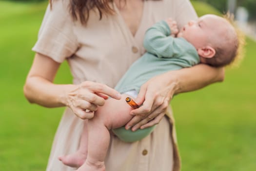 Loving mother gently applies soothing aroma oils to her precious newborn, creating a calming and nurturing atmosphere.