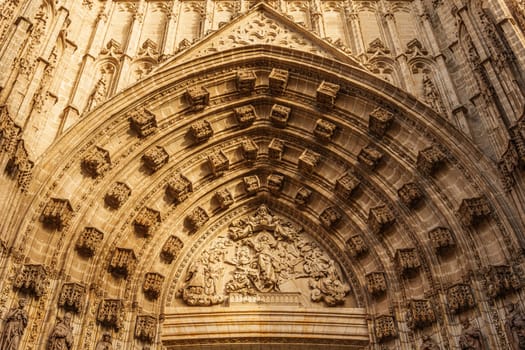 The Assumption facade on the main façade of the Seville Cathedral