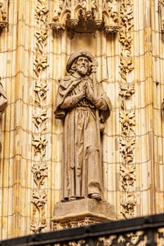 Statue of the apostle Saint James the Greater on the Assumption Gate of the Cathedral of Seville