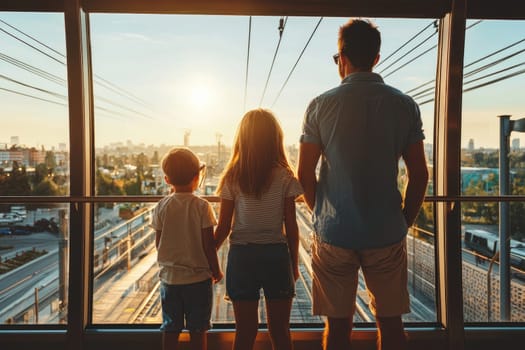 A touching scene of a father with his two children observing a beautiful sunset from a cable car, surrounded by an urban landscape, capturing a moment of family togetherness and joy.