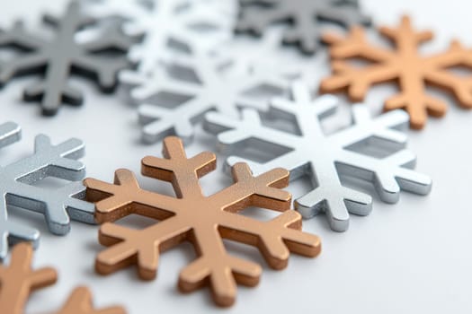 Metallic snowflakes in silver, gold, and bronze create festive atmosphere.