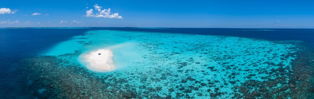 Sandbank experience with picnic in Gaafu Dhaalu Atoll Maguhdhuvaa Island, Maldives. High quality photo