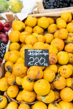persimmon market juicy fresh organic fruit raw harvest vegetable health food green vegetarian