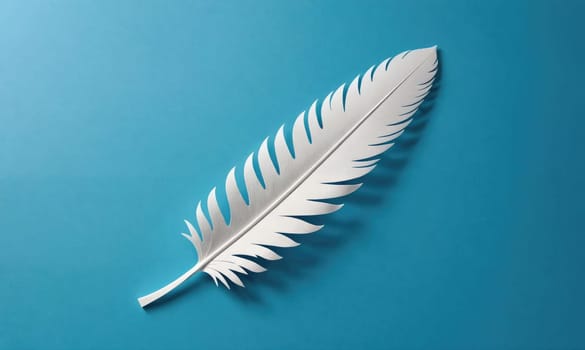 A single white feather lies on a blue surface, its delicate structure highlighted against the bright background.