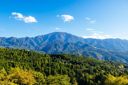 Hiking path landscape on the famous Magome-Tsumago Trail as part of the Nakasendo Way between Magome and Tsumago in Gifu Prefecture, Japan