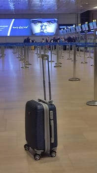 15 October 2024 Tel-Aviv Israel Ben Gurion airport, Terminal 3, tourists' suitcase trolley bag. Airport luggage are standing in the travel hall. High quality photo