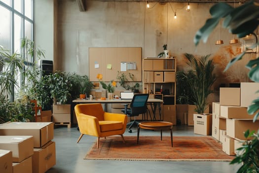 This inviting office area features a bright yellow chair and a wooden table, surrounded by lush plants and neatly stacked boxes, creating a productive atmosphere.