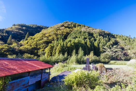 Hiking path landscape on the famous Magome-Tsumago Trail as part of the Nakasendo Way between Magome and Tsumago in Gifu Prefecture, Japan