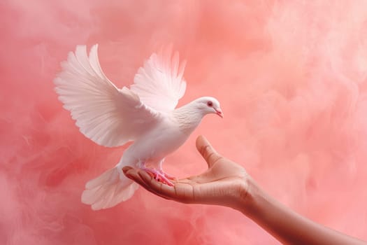 A stunning white dove elegantly rises from a hand against a dreamy pink backdrop, capturing the essence of tranquility, peace, and the beauty of nature in this artistic image.
