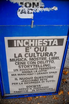 Cremona, Lombardy, Italy - November 7th 2024 A poster on a blue billboard raises questions about the presence of culture in a revitalized city lacking large spaces