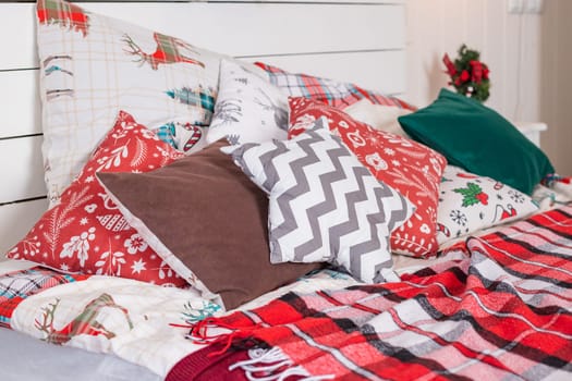 Winter Xmas Hygge home decor. Festive cozy bedroom in Skandinavian style