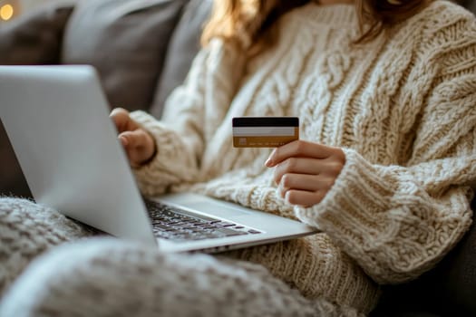 a woman makes a purchase on the Internet on the computer with credit card. High quality illustration