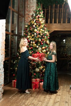 present celebration surprise girl family decoration christmas people winter tree holiday gift